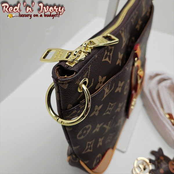 DAO7 Monogram Sling (DAO)