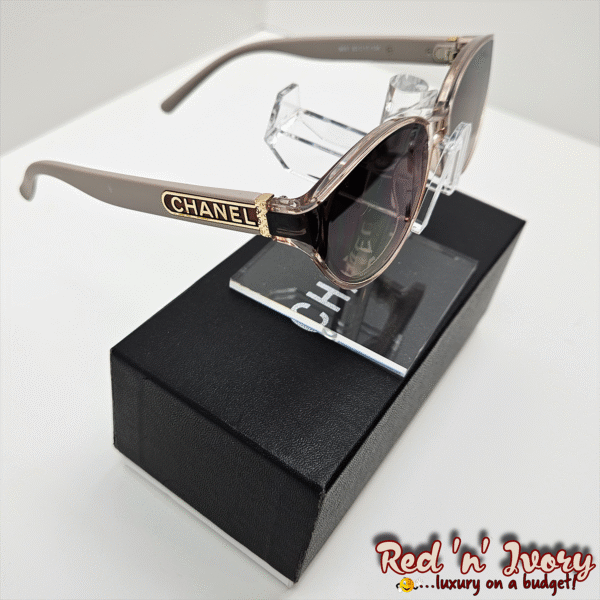 Cat-Eye Sunglasses (EAX)